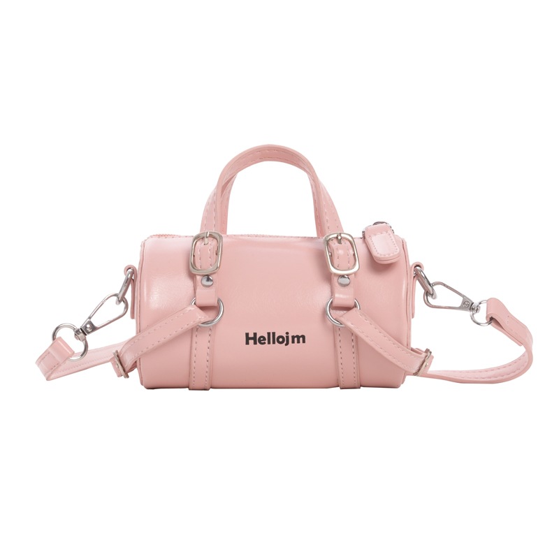 Coreano simple color sólido bolsas de hombro para niños y niñas bolsas de cilindro mini compactas para bebés bolsas de almohada para niños de comercio exterior transfronterizo