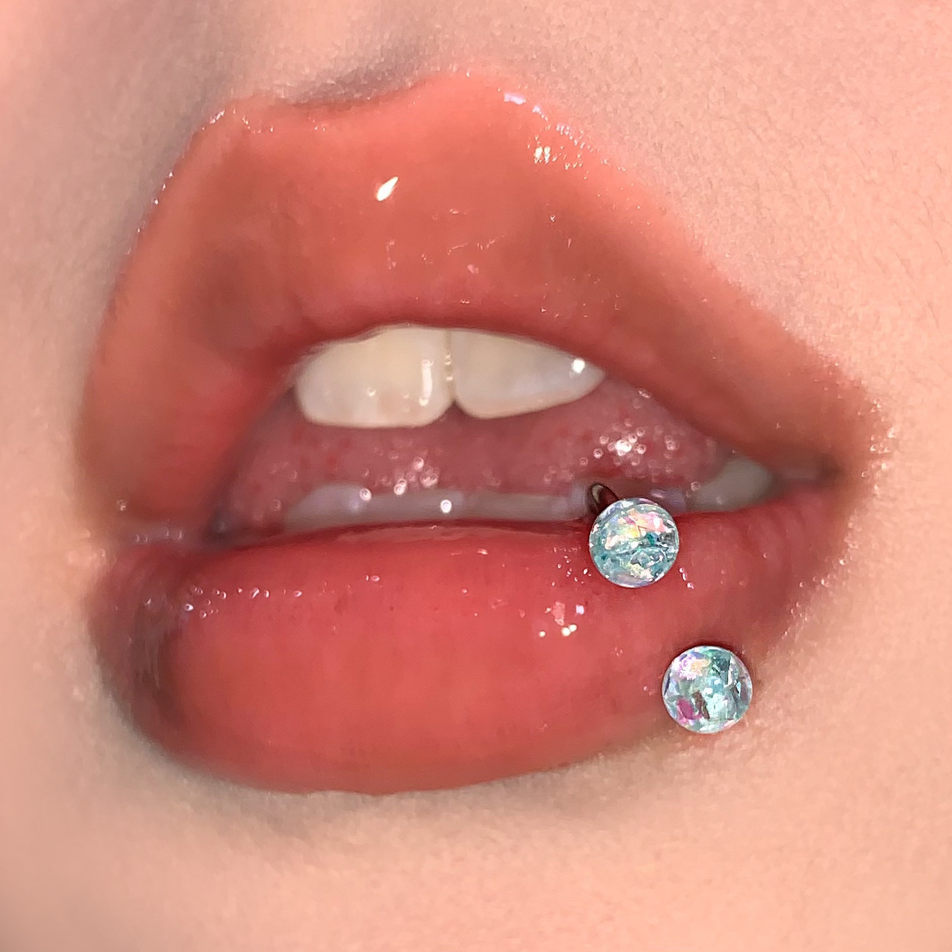 Silver pointed spike labret stud material detail