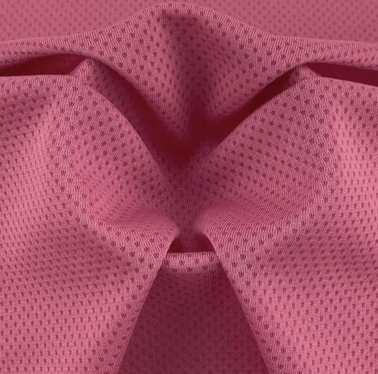 Spot Shuangyi.com Promoción especial poliéster absorbente de humedad rápida secado deportivo tela de malla Jacquard panal
