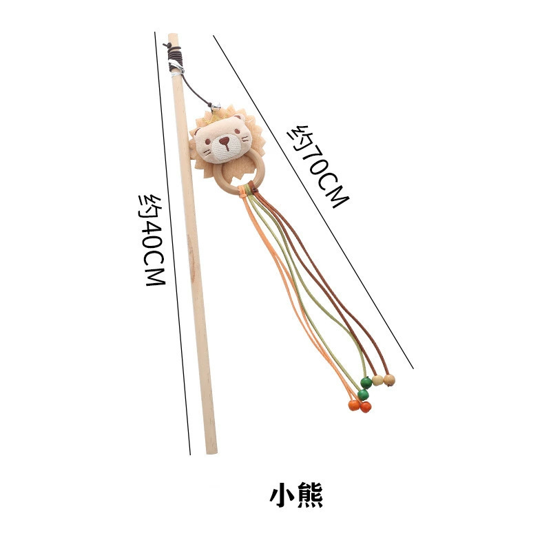 작은 곰 고양이 놀리는 막대기