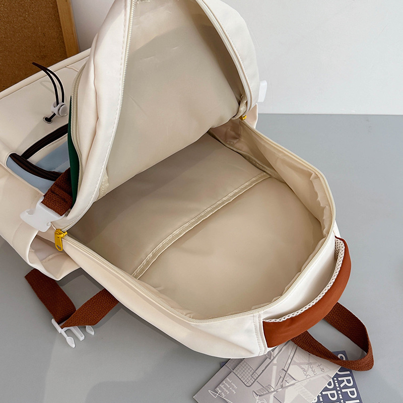 Mochila de gran capacidad 2024 nueva mochila de color en contraste para estudiantes al aire libre viajes de ocio mochila de todo fósforo para mujeres al por mayor