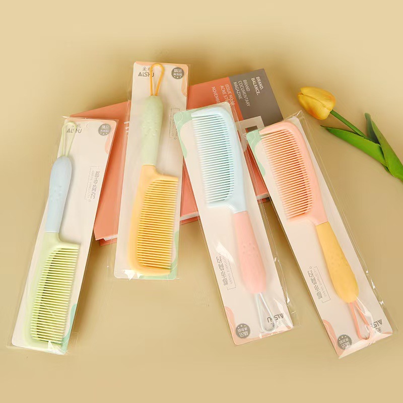 Nuevo paquete de impresión de cuerda de colgante independiente de trigo rollo de peinado de plástico peinado de belleza tienda de dos yuanes asequible