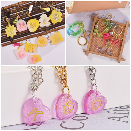 11-piece resin molds featuring English letters and numbers, with holes for pendants, earrings, and other accessories, made of silicone