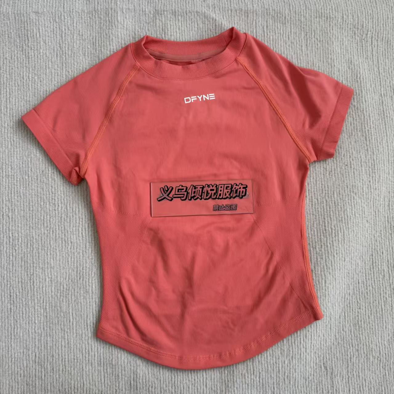 Aliexpress nuevo DFYNE mangas cortas mate nylon alta elástica cuerpo apretado sin bordas de acondicionamiento deportivo T mangas cortas