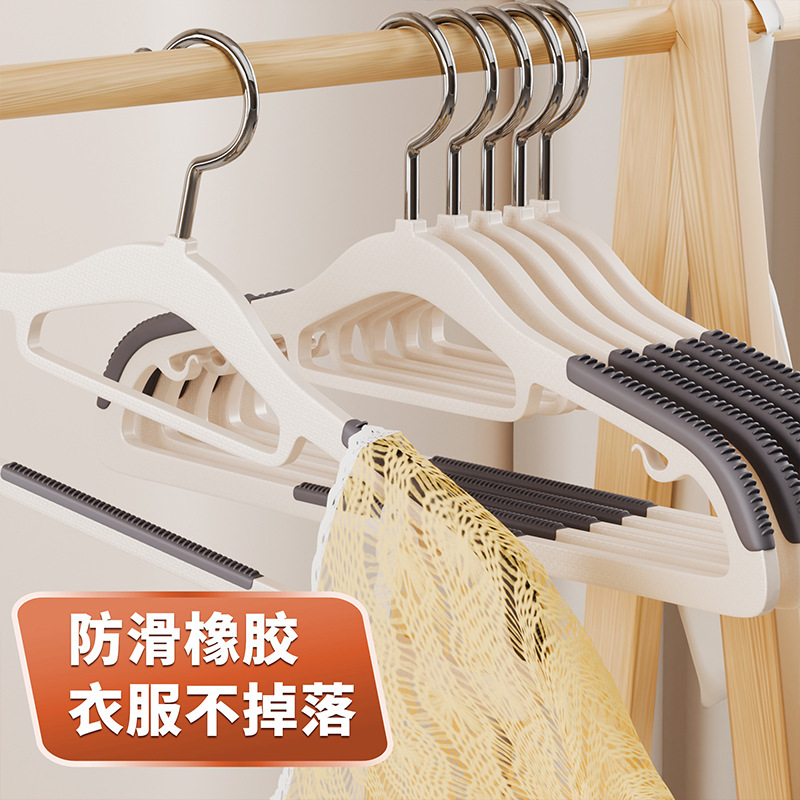 痕跡のないハンガーは太くて、滑り止めの家庭用服は回転できる多機能の広い肩の寮の乾湿両用服を掛けます。|undefined