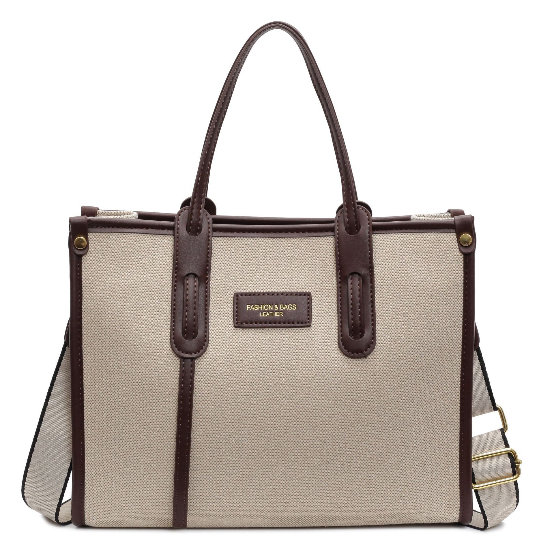 Bolsa de lona de gran capacidad para mujeres 2024 nuevo estilo sensación de moda mochila de hombro para viajar bolso de mano universal