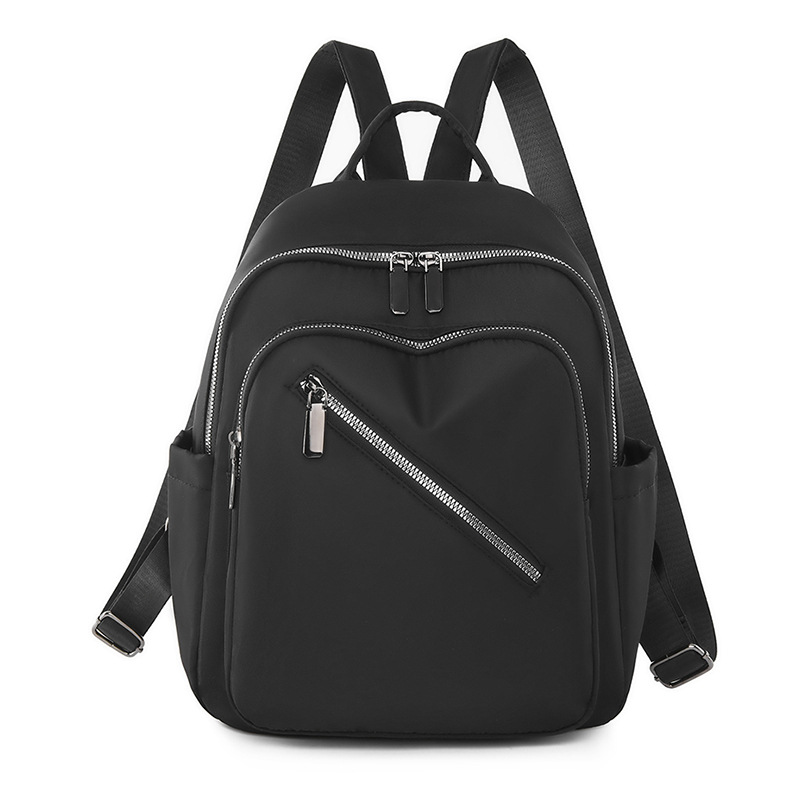 Comercio exterior al por mayor 2023 nueva mochila de nailon casual para mujer, mochila de viaje al aire libre literaria simple, mochila escolar