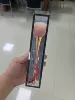 Wineglass contains rose, golden brush, pack PVC