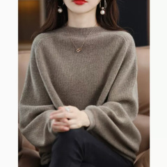 ファッションのゆるいコウモリの袖のニットのセーターの女性の秋冬の新型の怠惰な洋風の高級感はやせている底のシャツの上着を現します。