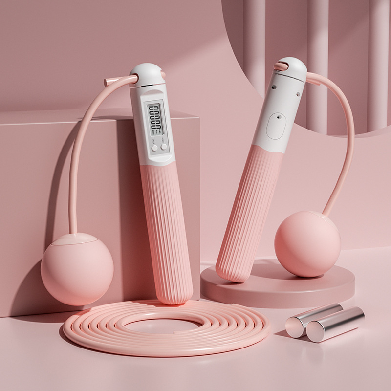 분홍색과 흰색의 큰 공 연장 로프