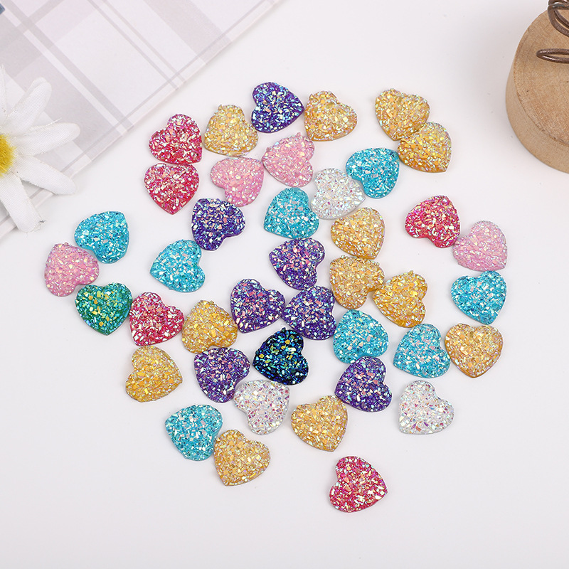 AB amor corazón mineral de cristal racimo melocotón corazón pendientes ropa DIY accesorios de decoración de resina ventas directas de la fábrica