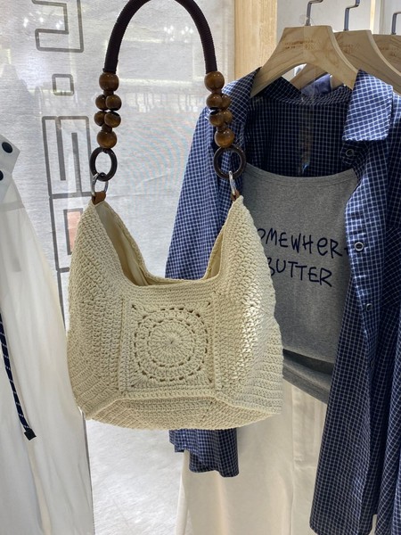 Capacious knitted handmade bag