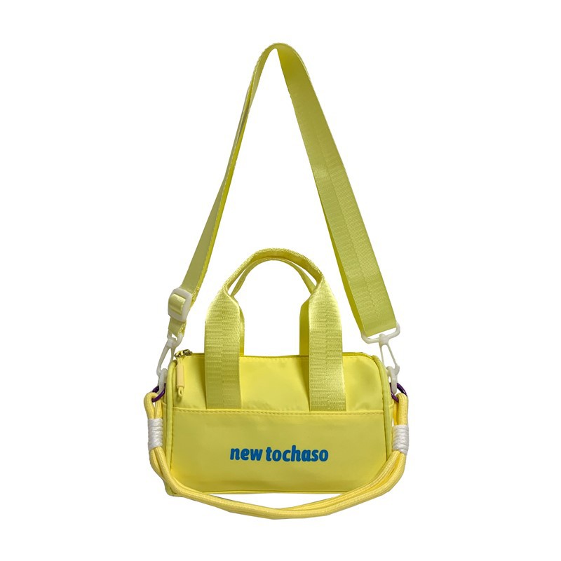 Bolsa de hombro casuales coreana para niños y niñas, letras extranjeras para bebés, bolsas portátiles de balde de agua 2025, nuevas bolsas de comercio exterior para niños