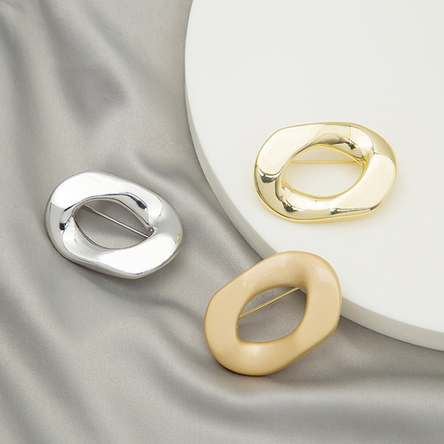 European and American fashionable glossy irregular geometric design round brooch creative personalized suit accessories
