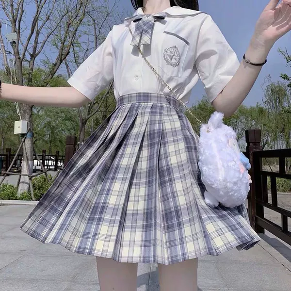 White shirt, skirt, bow tie