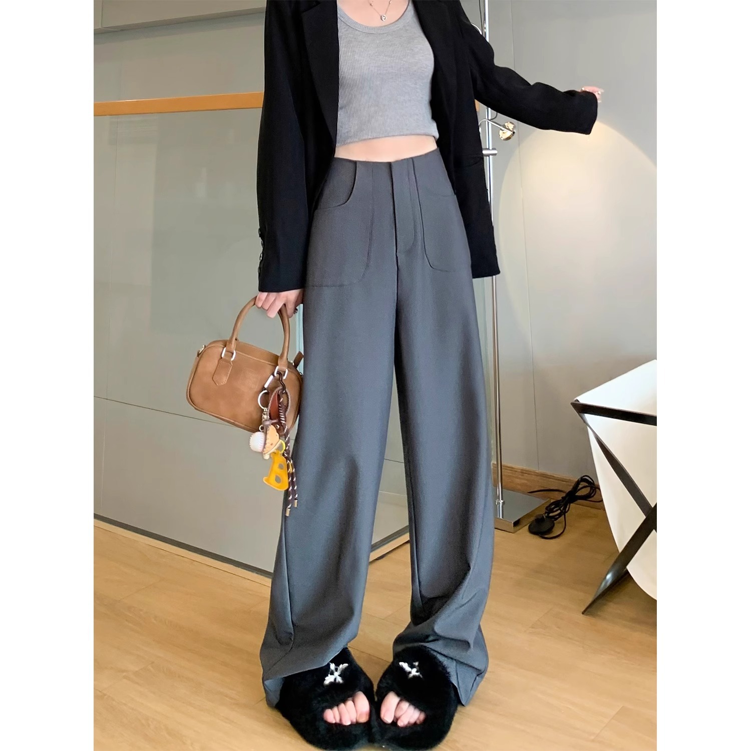 Pantalones de piernas anchas negras de mujeres primavera y otoño 2025 nuevos pantalones de trajes relajados y casuales rectos estrechos de alto nivel