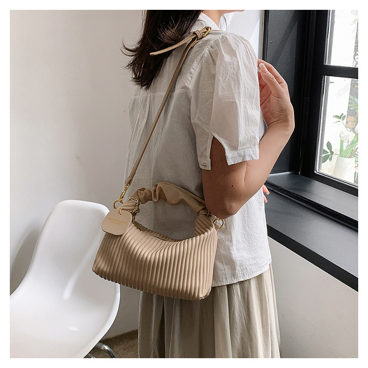 Strukturierte Handtasche mit vertikalen Streifen 2024, neues Nischendesign, Umhängetasche mit einer Schulter, vielseitige Tasche im ausländischen Stil, Großhandel für Damen_voghion.com