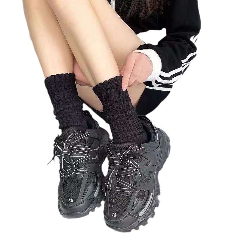 街頭のファッションの純色の積み重ねの靴下の日系の高い顔の値の女性の靴下のネットの赤い爆発の女性の百合jkの靴下の決まります。