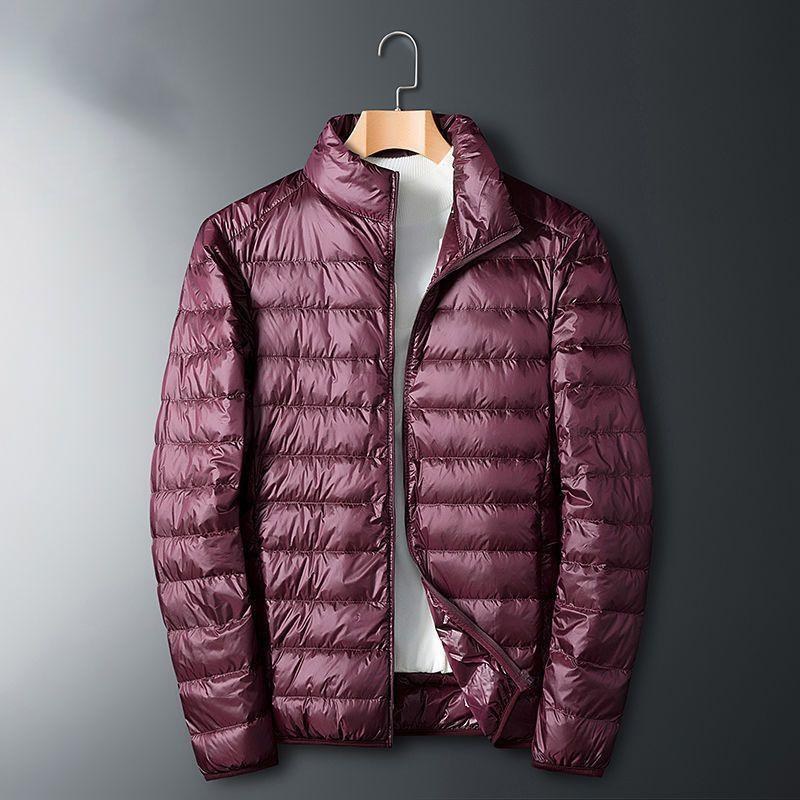 Chaqueta de algodón de terciopelo ligero para hombres de calidad Chaqueta deportiva cálida de moda de otoño e invierno de gran tamaño con cuello alto corto para hombres