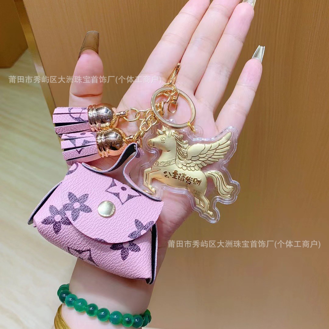 Año del Caballo de oro llavero de automóvil pequeño colgante 999 dinero de inmediato bolso llavero personalizado pequeño regalo