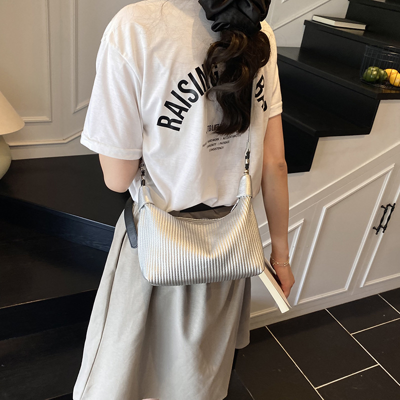 Bolso de moda coreano 2025 verano nuevo bolso femenino estilo ins bolso de hombro simple bolso de mensajero a rayas simple
