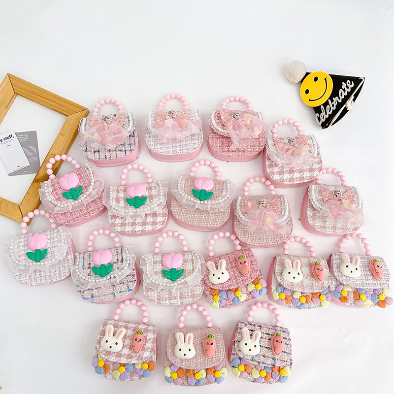 2022 nuevos niños bolso de hombro crossbody Chanel estilo niñas bolsa perla portátil accesorios de dibujos animados bolsa de desgaste