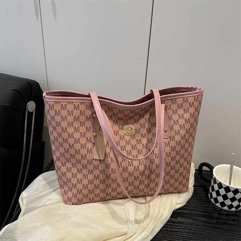 Europa y América retró personalidad de gran capacidad letras impresas simples bolsos grandes para mujeres 2025 nueva bolsa de hombro de viaje