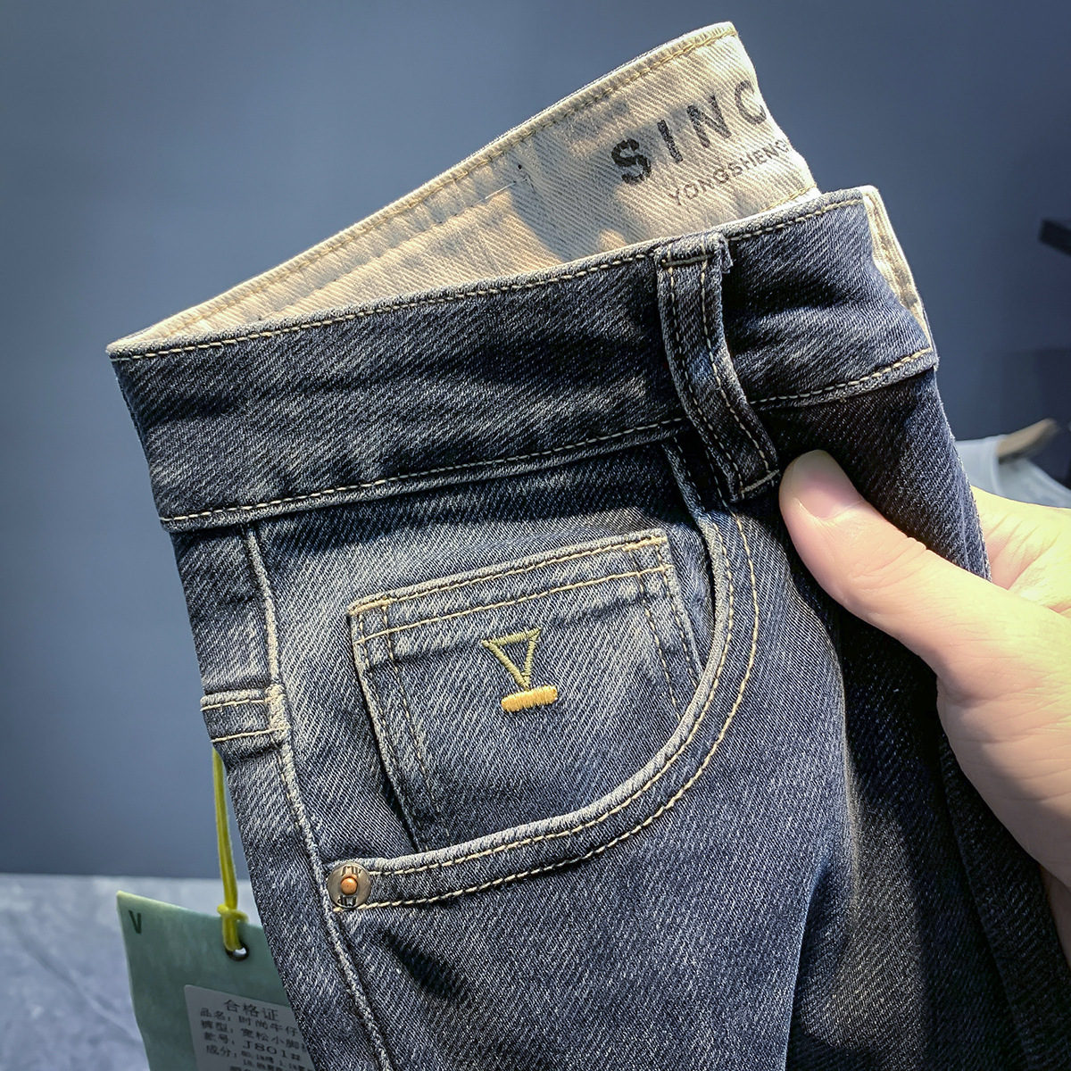Jeans élastiques de marque de mode européenne pour les nouveaux styles de printemps et d'automne, pantalons polyvalents slim fit haut de gamme pour hommes_voghion.com