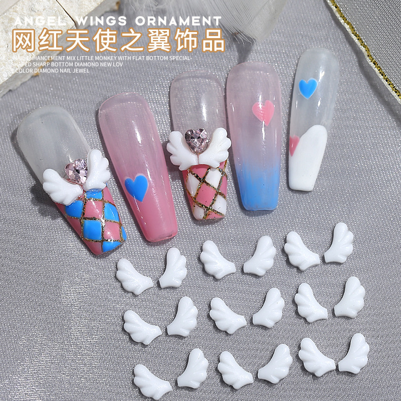 Net Red new angel wings nail art jewelry white three-dimensional resin left and right wings DIY nail decoration wholesale