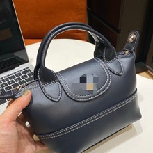 高品质新款设计抽绳水桶包女高级烧麦包百搭手提包休闲单肩斜挎包