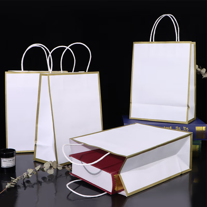 现货批发边框牛皮纸手提袋高档礼品服装店购物袋手提袋现货可加印