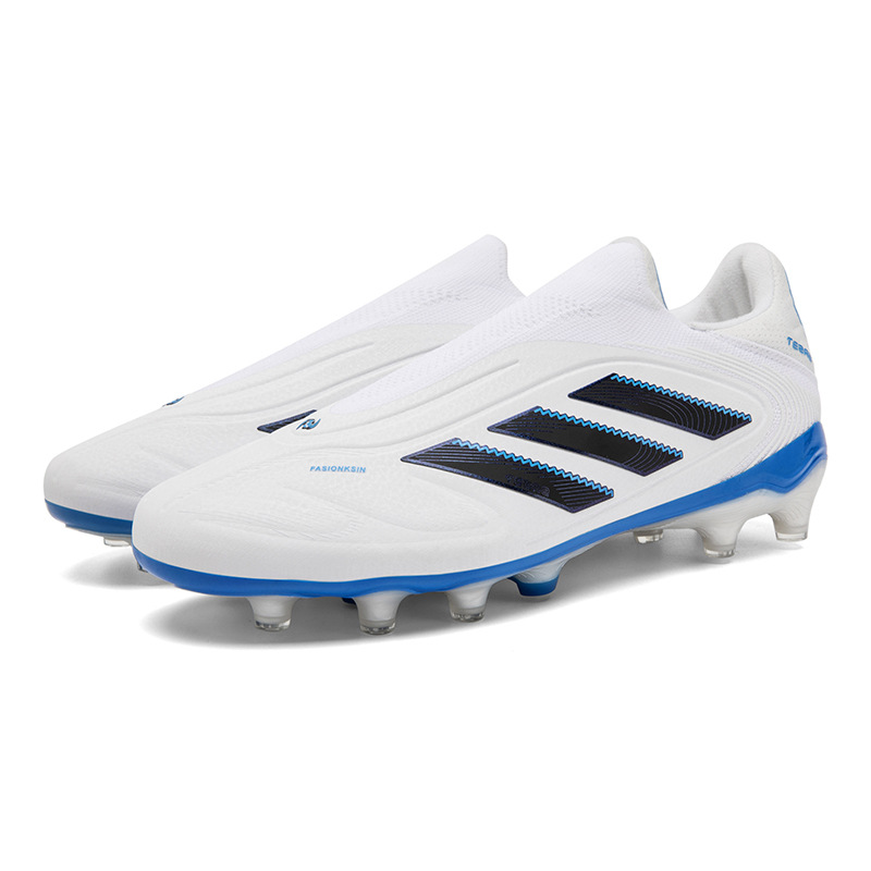 Nuevos zapatos de fútbol de moda transfronterizos para hombres y mujeres, carreras juveniles de clavos largos sin correa de fábrica