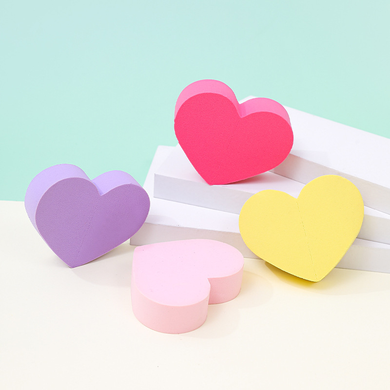 Fábrica personalizada de polvo en forma de corazón almohadilla de aire de amor de桃ar herramientas de maquillaje de doble cara esponja de huevo de maquillaje no comer polvo