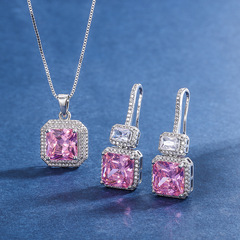 "Hot-selling celebrity-style faux diamond pendant earrings and necklace set for women, featuring a 10x10mm main stone"