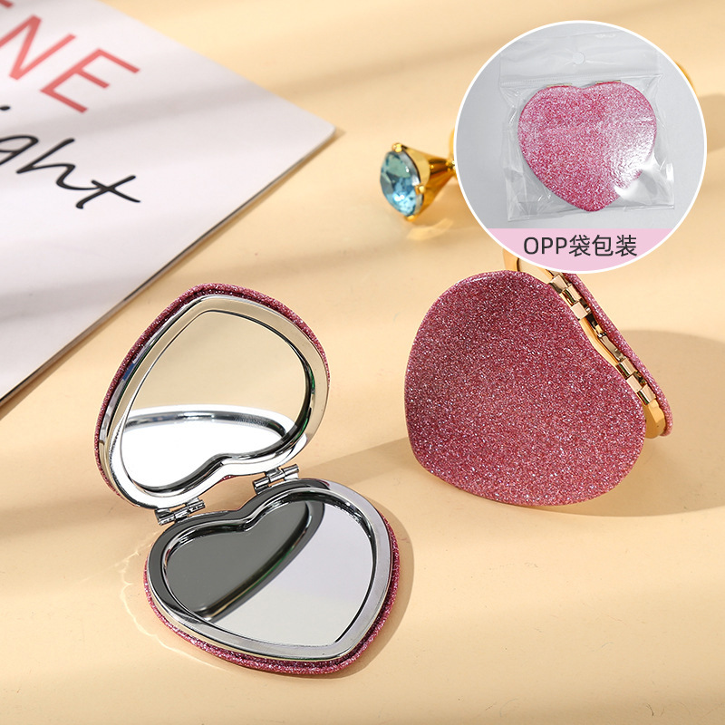 Espejo pequeño de amor de alto valor con mini dormitorio de estudiante espejo plegable de doble cara espejo de maquillaje portátil redondo