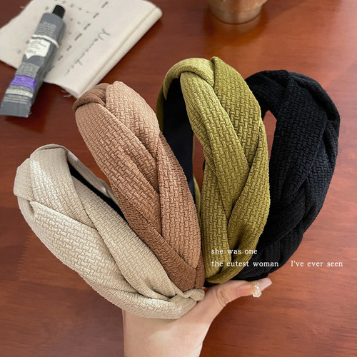 Retro braided high top headband for women, niche headband with a touch of elegance, versatile wide headband for hair compression and styling.