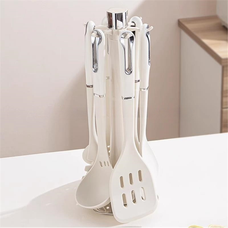 Nuevo juego transfronterizo de utensilios de cocina de silicona de 7 piezas, utensilios de cocina de grado alimenticio, pala, cuchara, mango de gota de agua, juego de silicona de 7 piezas