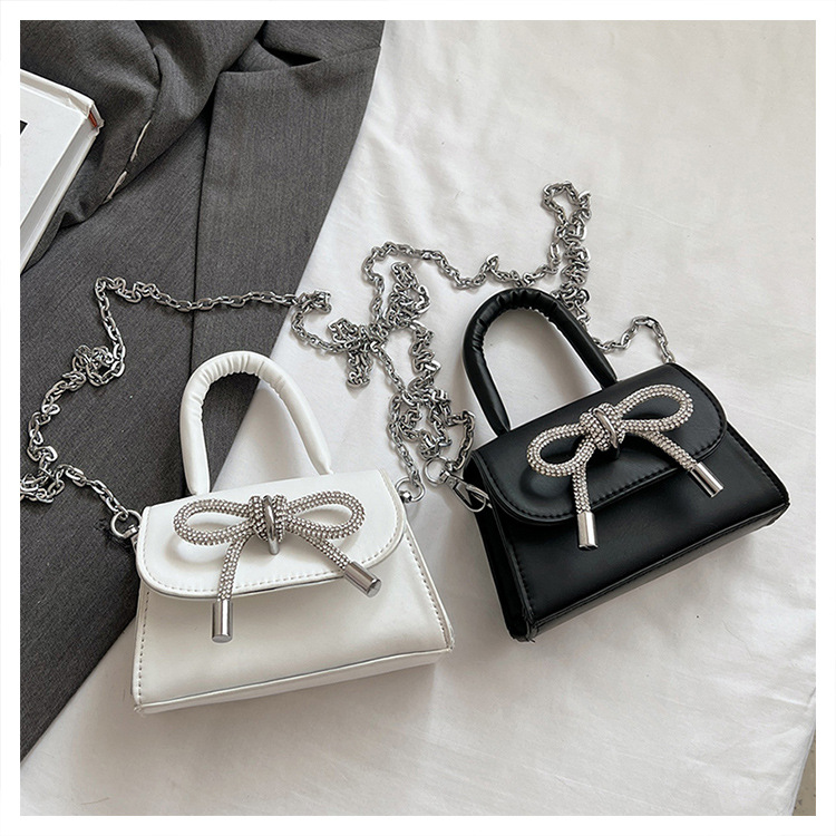 Ins niche French textured bag female 2024 new bow small square bag stylish shoulder messenger bag_voghion.com