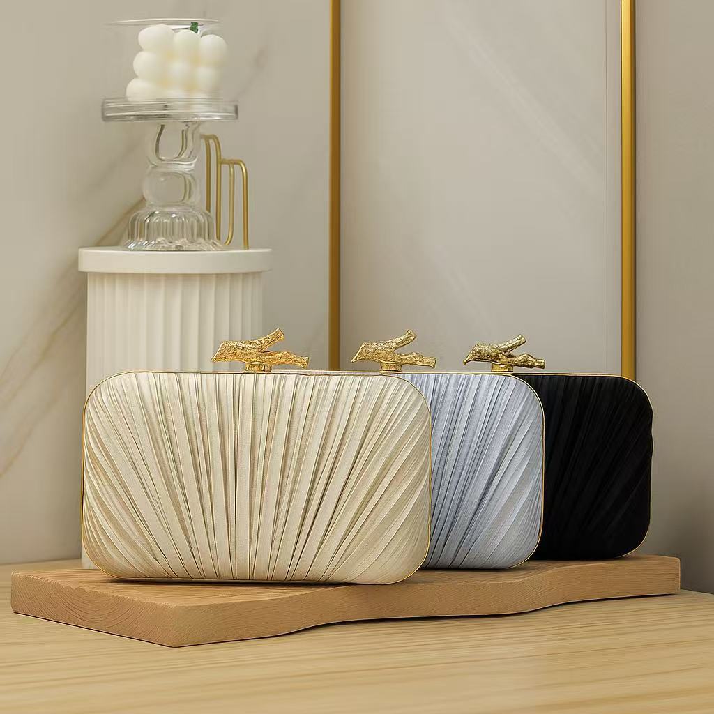 2025 nueva bolsa de cena retro transfronteriza, bolsas de mano de alta sensación, bolsas de cena de moda, bolsas de caja plegadas