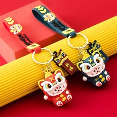 トトロが目を覚ましたライオンの招き猫の可愛いキーホルダーはトラのペンダントです。