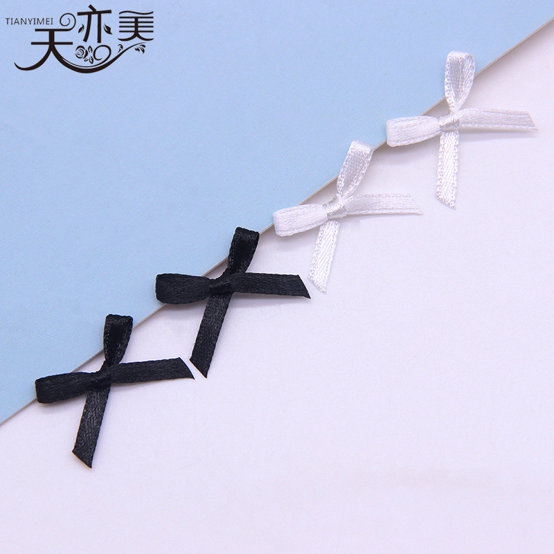 En stock 0,3 cm cinta de poliéster blanco y negro pequeño arco caja de regalo ropa interior decorativa ropa interior DIY arco