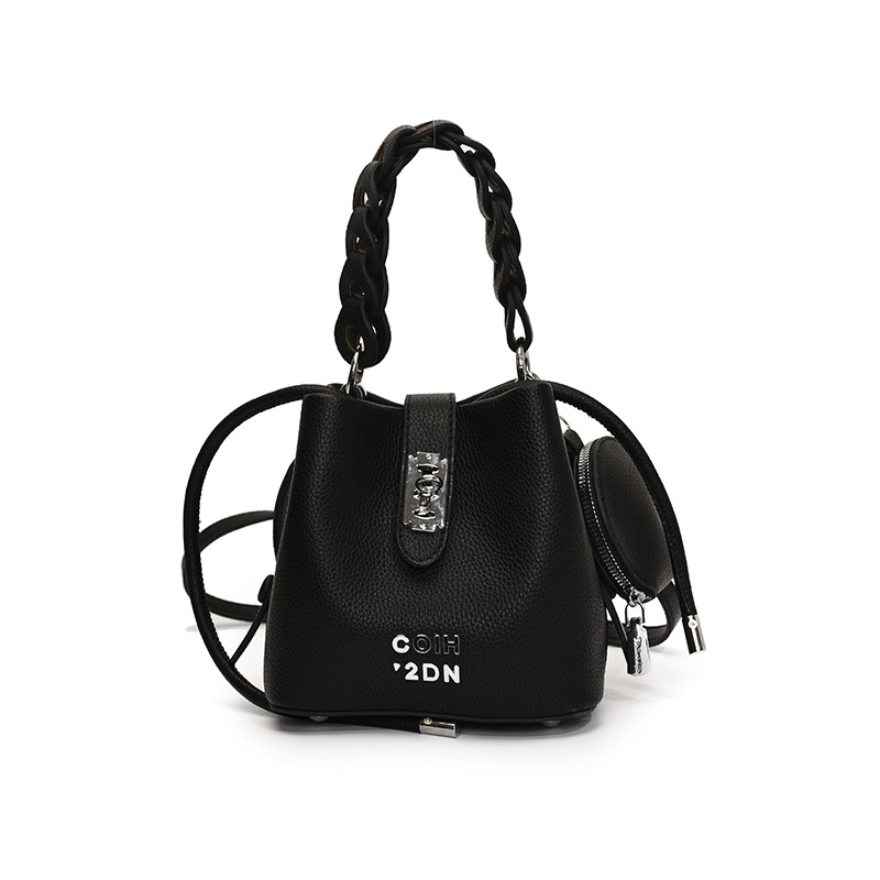 Bolso de mujer 2025 nuevo bolso de mensajero de hombro con patrón de lichi de alta calidad bolso de cubo portátil de moda casual de todo fósforo