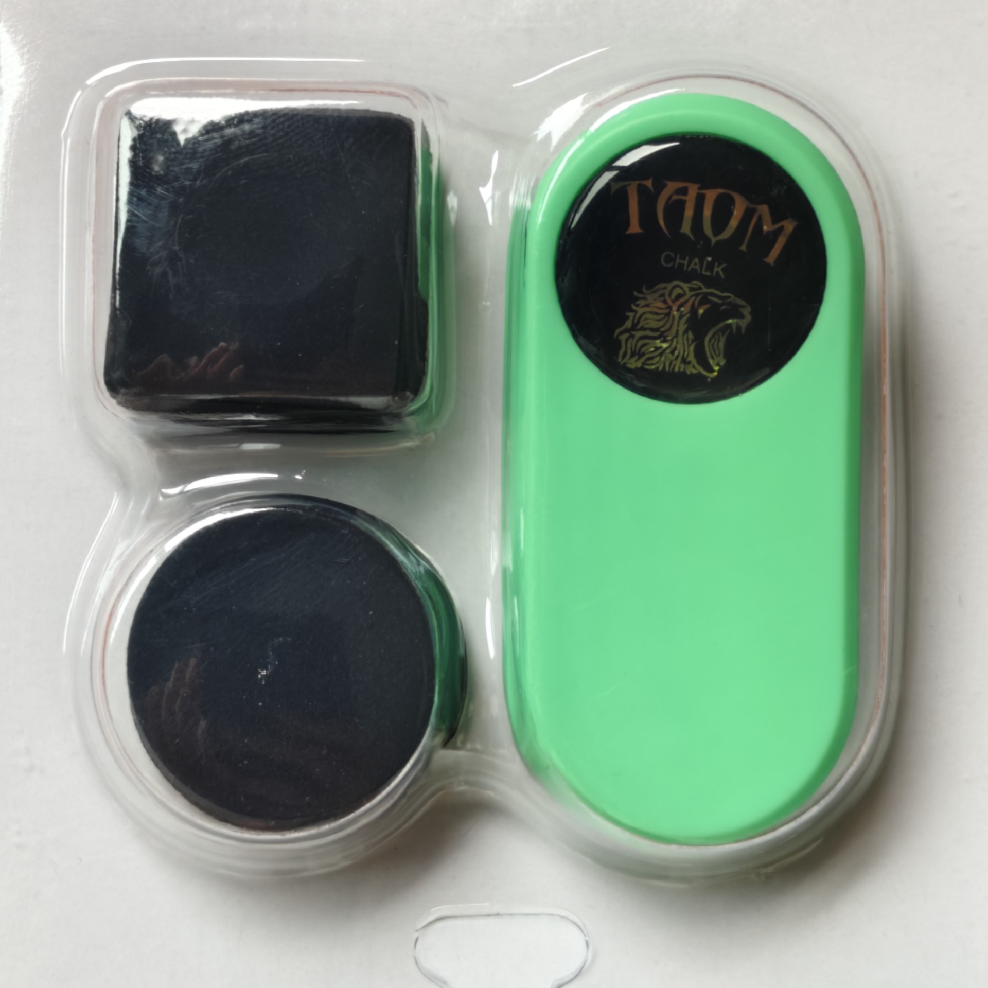 A set of Tawum gold label green chocolate clips