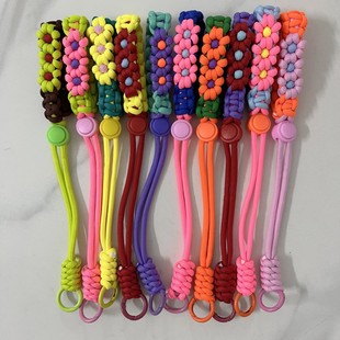 Mobile phone lanyard hand-woven flower wrist travel short mobile phone chain pendant bag camera female high-end lanyard