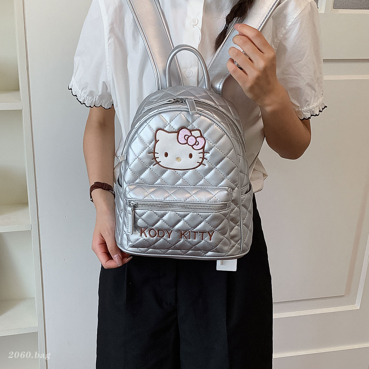 Liebre mochila de estudiantes coreana 2026 mochila popular femenina de dibujos animados versátil nuevo estilo de viento de gran capacidad para viajar a la niña