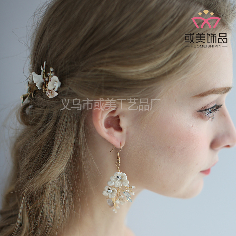 C176或いは美の花嫁のアクセサリの卸売りのヘアピンのイヤリングのヘアピンのセットの手作りの陶磁器のアクセサリーの欧米の頭飾りの新商品