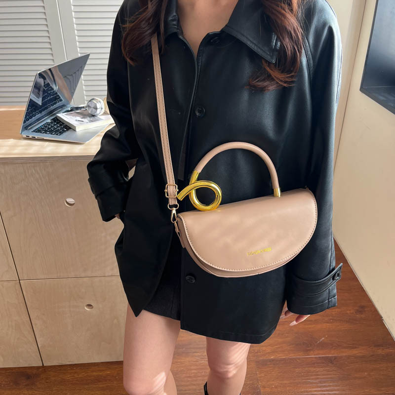 Diseño de alta calidad bolsos de mano bolsos de mujer sensación retro nicho silla transfronteriza estilo simple nueva bolsa universal
