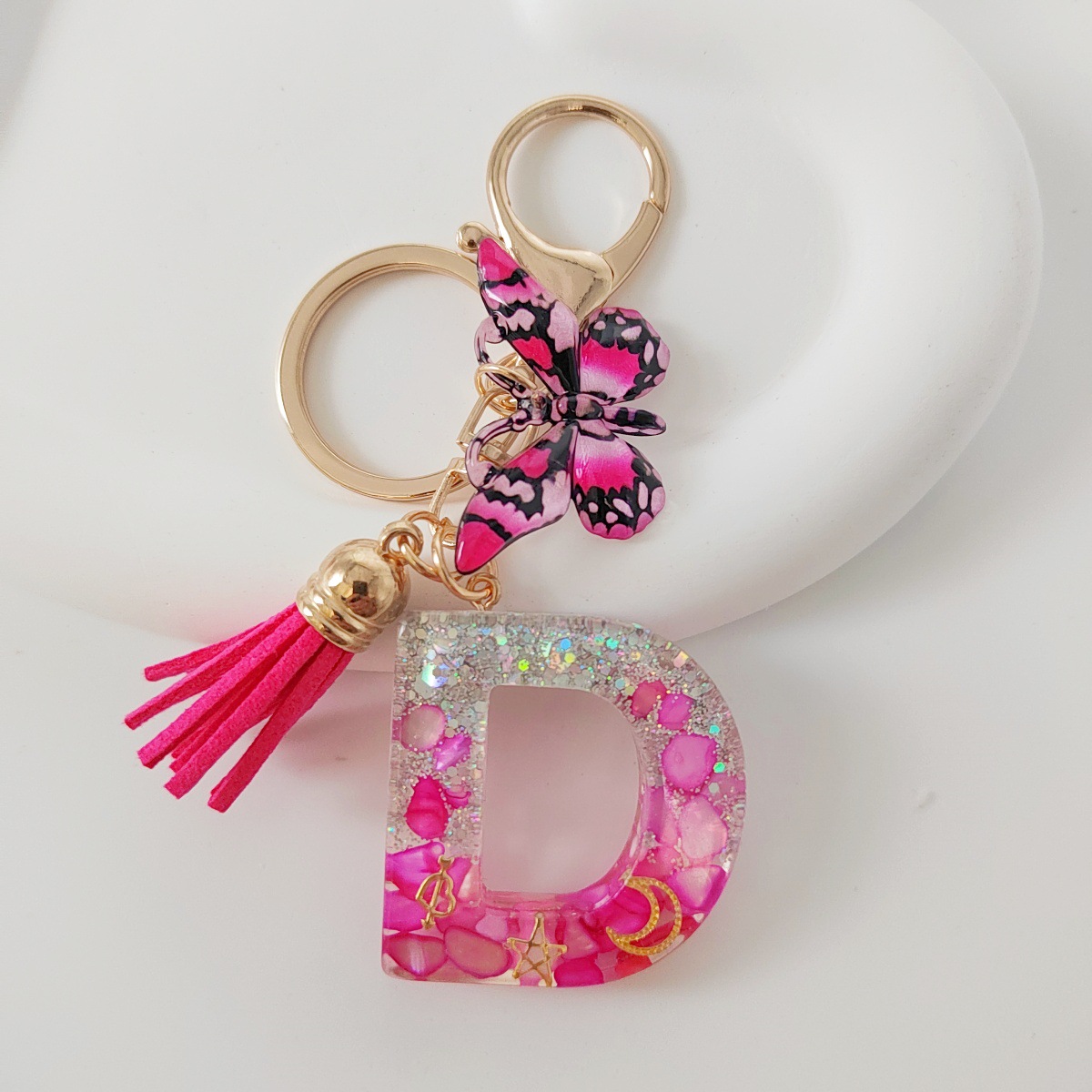 Inventario transfronterizo nueva resina bicolor mariposa borda llavero colgante estrella luna accesorios de joyas