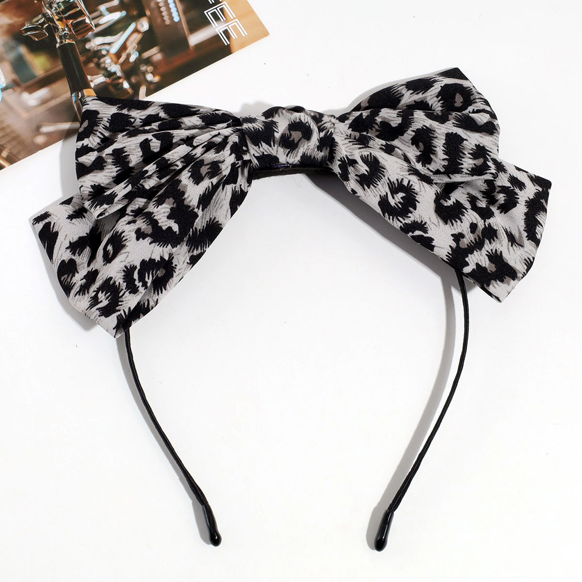 Estilo de moda europeo y americano personalidad nicho de diseño arco leopardo aro de pelo clip de resorte retrógrado anillo para el pelo accesorios para el pelo