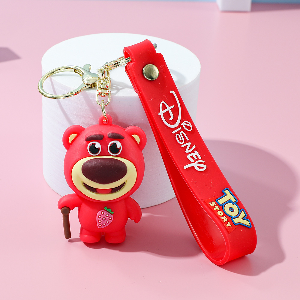 Llavero de silicona de Toy Story, el popular dibujo animado, con personajes como el alienígena de tres ojos, Buzz Lightyear y el oso Lotso, ideal como adorno para bolso.